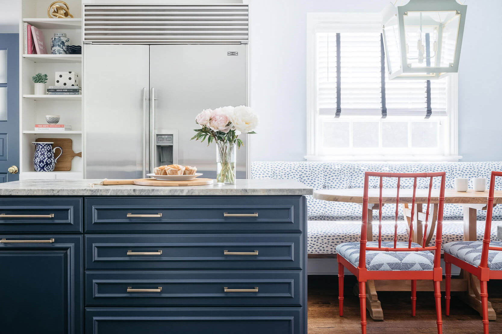 navy-blue-kitchen-island-gold-hardware-red-chairs-design-ideas-peabodys-interiors-wisconsin-emily-winters-2